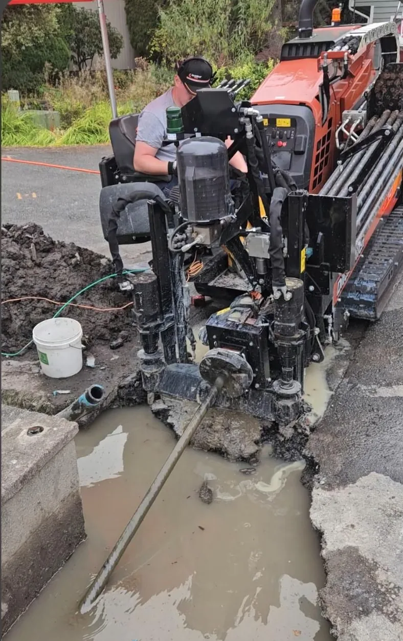 Trenchless water line work in progress by Done Right Plumbing